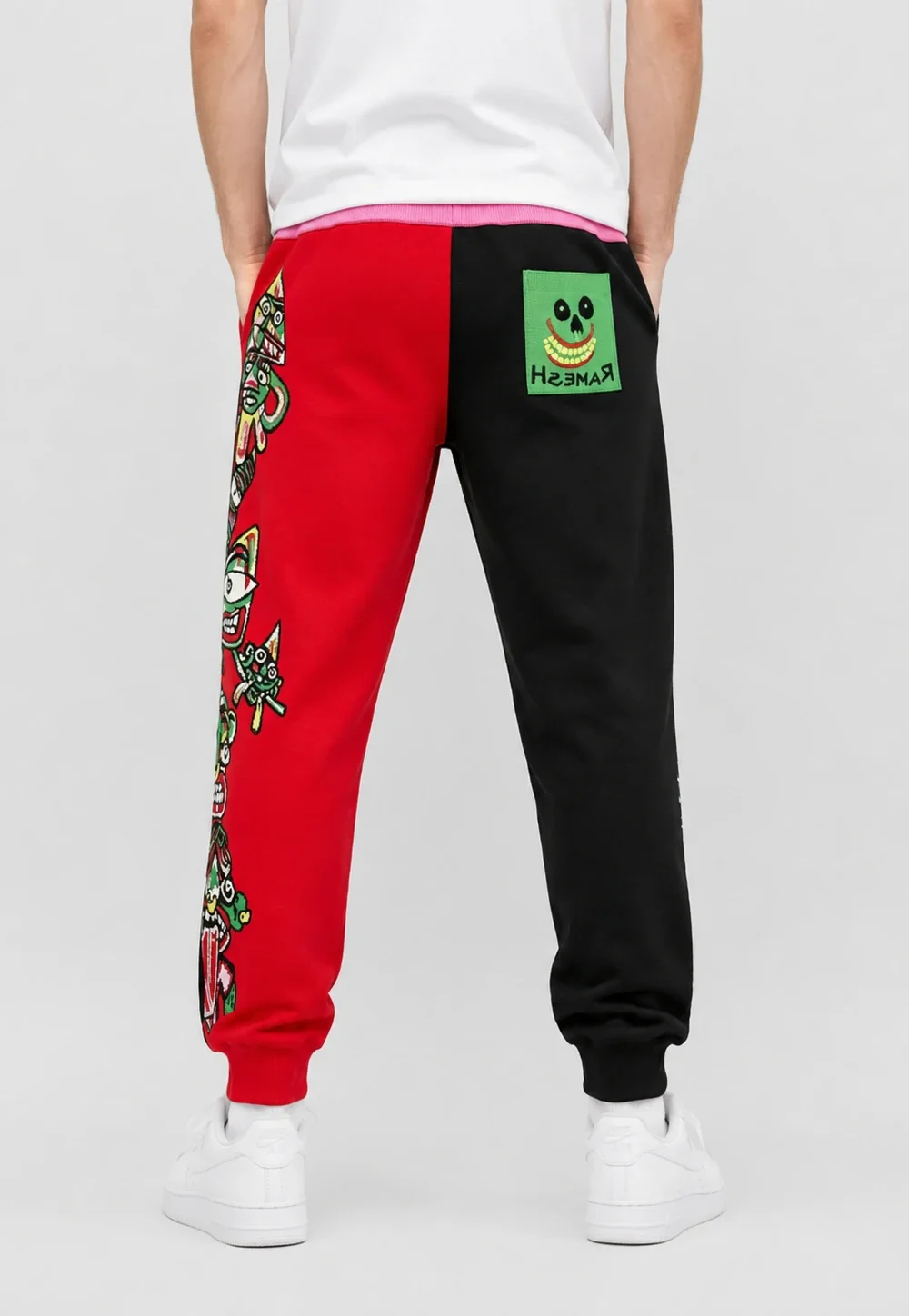 Split Black Red Contrast Graphic Snake Print Men Jogger Pants